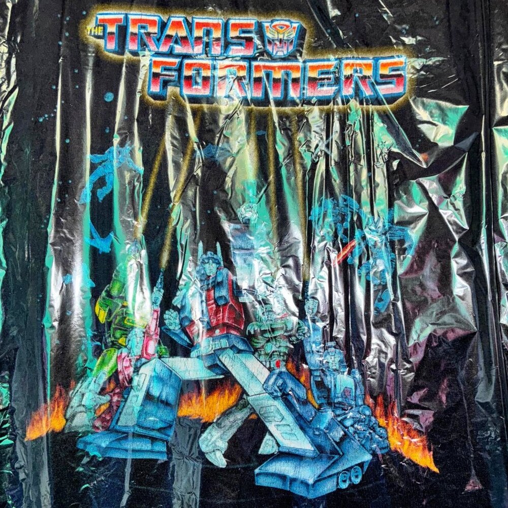 Transformers Black short sleeve shirt; graphic art is a group of giant robots!!!